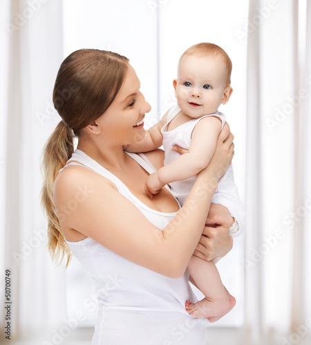 Photo: happy mother with adorable baby happy mother with adorable baby
