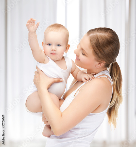 Photo: happy mother with adorable baby happy mother with adorable baby