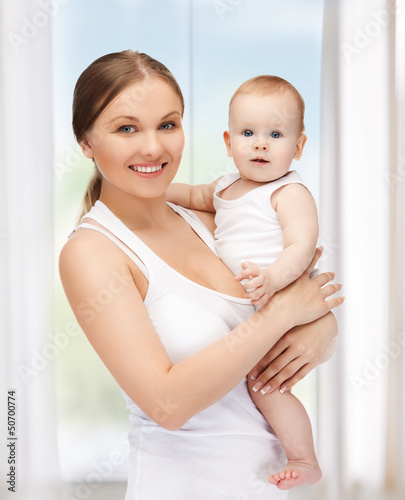 Photo: happy mother with adorable baby happy mother with adorable baby