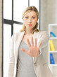 woman making stop gesture