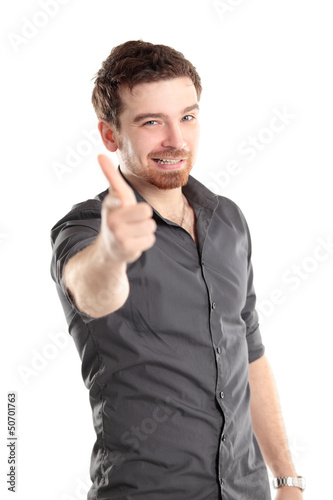 Photo: Happy man with thumbs up gesture, isolated on white Happy man with thumbs up gesture, isolated on white