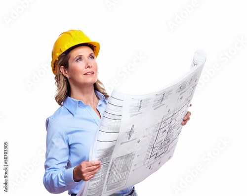 Photo: Architect woman with a plan. Architect woman with a plan.