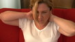 Woman having neck pain