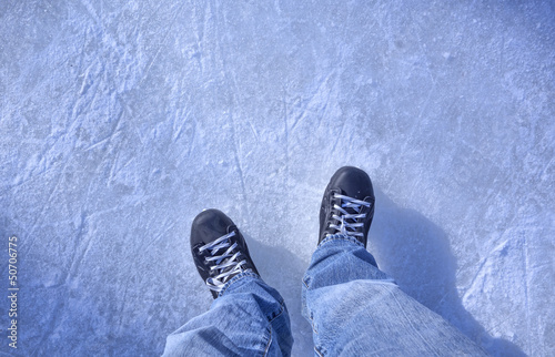 Photo: Hockey skates on ice Hockey skates on ice