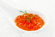 Caviar in spoon on ice