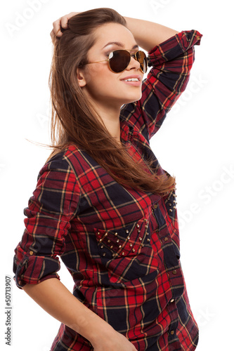 Photo: Young attractive woman in shirt and sunglasses Young attractive woman in shirt and sunglasses