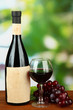 Photo: Composition of wine bottle, glass and grape, Composition of wine bottle, glass and grape,