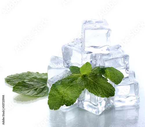 Photo: Ice with mint isolated on white Ice with mint isolated on white