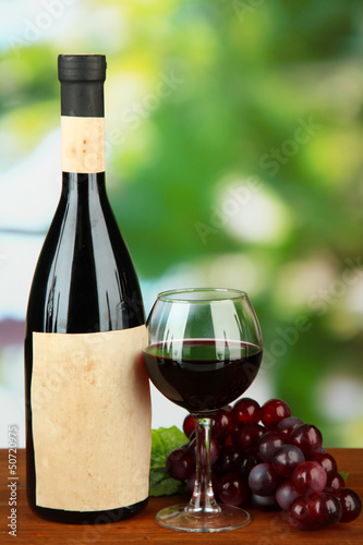 Photo: Composition of wine bottle, glass and grape, Composition of wine bottle, glass and grape,