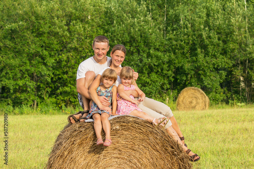 Photo: Happy family on vacation in summer day Happy family on vacation in summer day