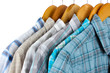 Shirts with ties on wooden hangers isolated on white