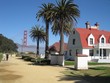 Golden Gate bridge in San Francisco with palm trees