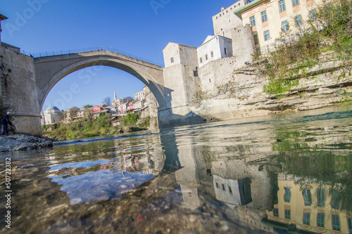 Photo: Old bridge over river Neretva in Mostar, Bosnia and Herzegovina Old bridge over river Neretva in Mostar, Bosnia and Herzegovina
