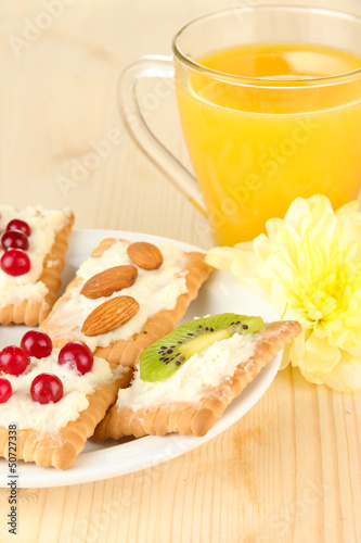 Photo: Tasty canapes with cheese, kiwi and cranberry, almond, Tasty canapes with cheese, kiwi and cranberry, almond,