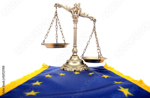 Photo: Scales of justice and Flag of European union Scales of justice and Flag of European union