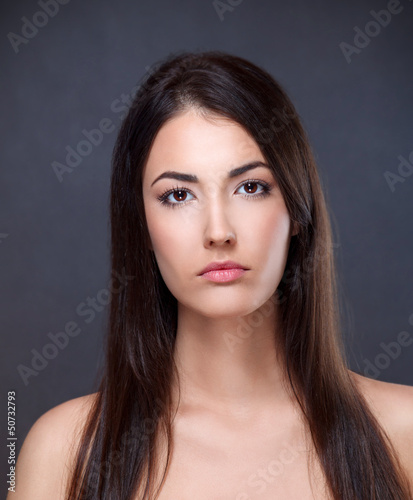 Photo: Beauty portrait of a young brunette Beauty portrait of a young brunette