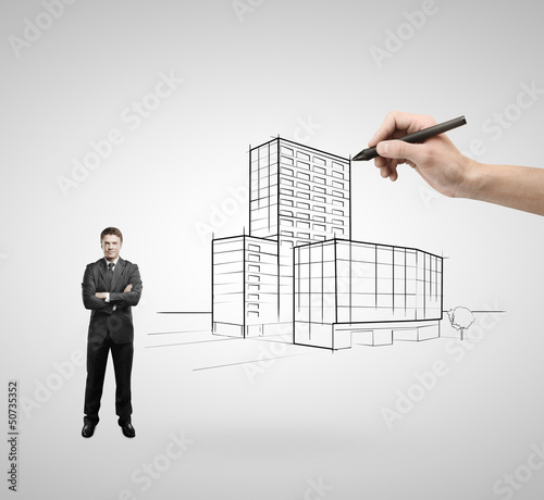 Photo: skyscraper and businessman skyscraper and businessman
