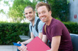 pair of happy young male students