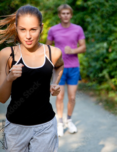 Photo: couple running couple running