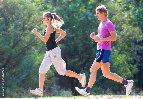 Photo: couple running couple running