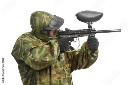 Photo: Aiming paintball player Aiming paintball player