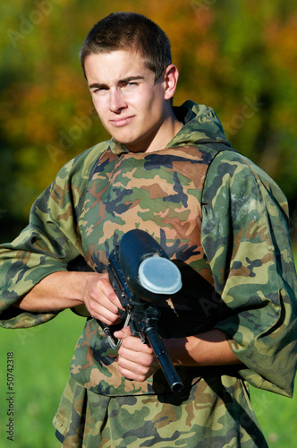 Photo: Man paintball player Man paintball player