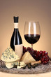 Refined still life of wine, cheese and grapes