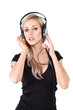 Foto: Young blonde woman with headphones Young blonde woman with headphones