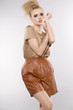 Foto: beautiful adult sensuality woman in brown dress beautiful adult sensuality woman in brown dress
