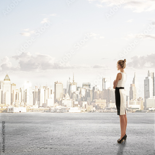 Photo: woman looking on city woman looking on city
