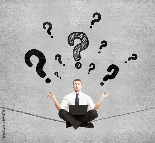 Photo: businessman and question mark businessman and question mark
