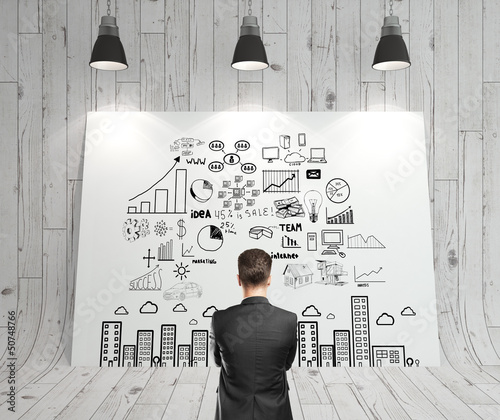 Photo: man looking business strategy man looking business strategy