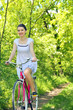 Photo: woman on a bicycle woman on a bicycle