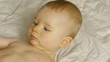 HD1080p Baby laying on a blanket