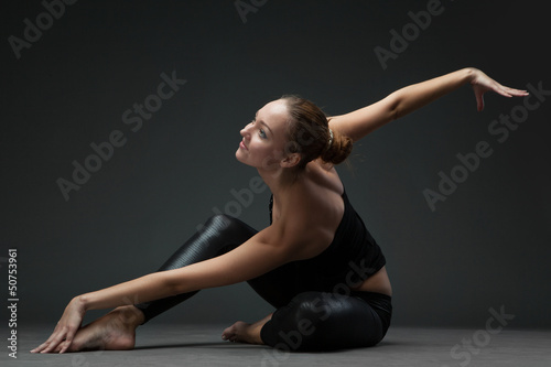 Photo: attractive young woman dancing attractive young woman dancing