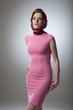 Portrait of sexy young woman in pink dress