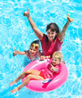 Photo: Family in swimming pool. Family in swimming pool.