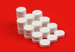 many of round pills in form of pyramid