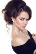 Beautiful Brunette Girl with hairstyle and make up isolated on w