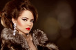 Fashion portrait. Beautiful woman with evening make-up. Jewelry