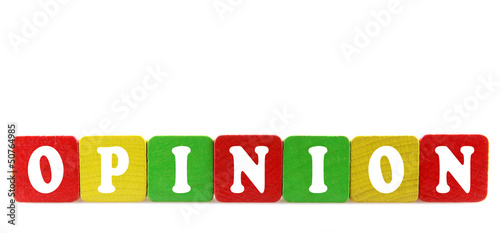 Photo: opinion - isolated text in wooden building blocks opinion - isolated text in wooden building blocks