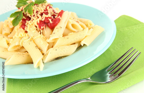 Photo: Rigatoni pasta dish with tomato sauce close up Rigatoni pasta dish with tomato sauce close up