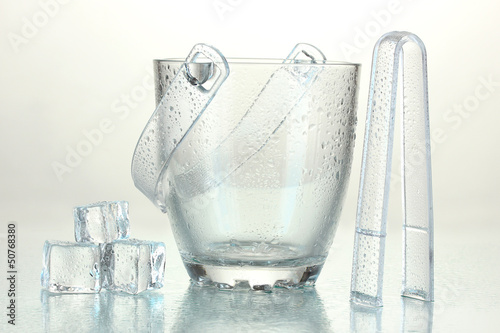 Photo: Glass ice bucket isolated on white Glass ice bucket isolated on white