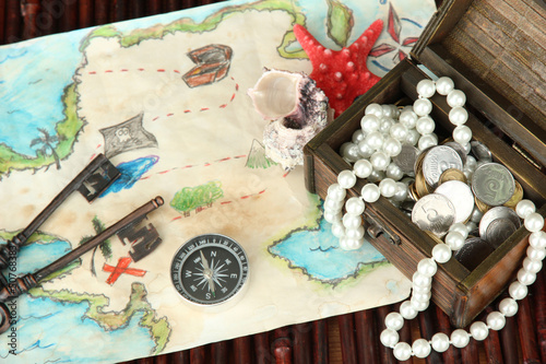 Photo: map of treasures on dark wooden background map of treasures on dark wooden background