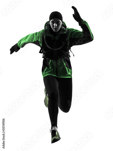 Photo: woman runner running trekking silhouette woman runner running trekking silhouette
