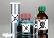Deadly poison in bottles on grey background