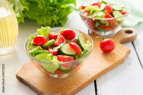 Photo: Fresh salad from cucumbers and tomatoes Fresh salad from cucumbers and tomatoes