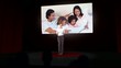 Animation of businesswoman presenting a family montage
