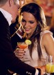 Woman Listening As Her Boyfriend Whispers Something