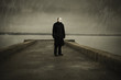man with white mask near the river